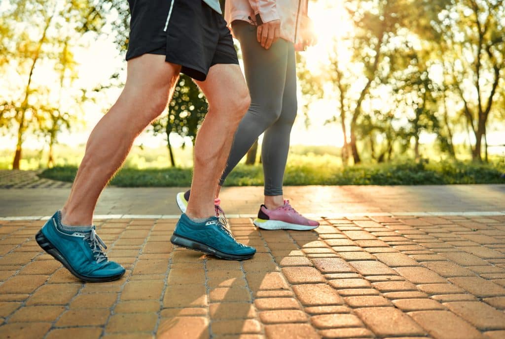 Closeup of two people on a walk for exercising