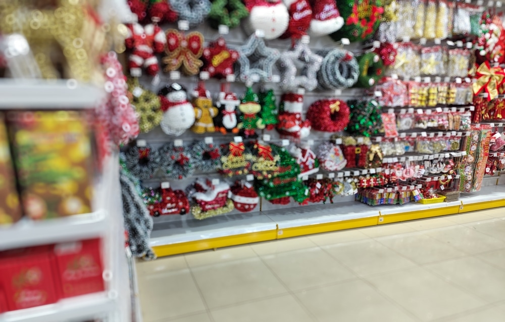 Lots of Christmas decorations for sale in a store.