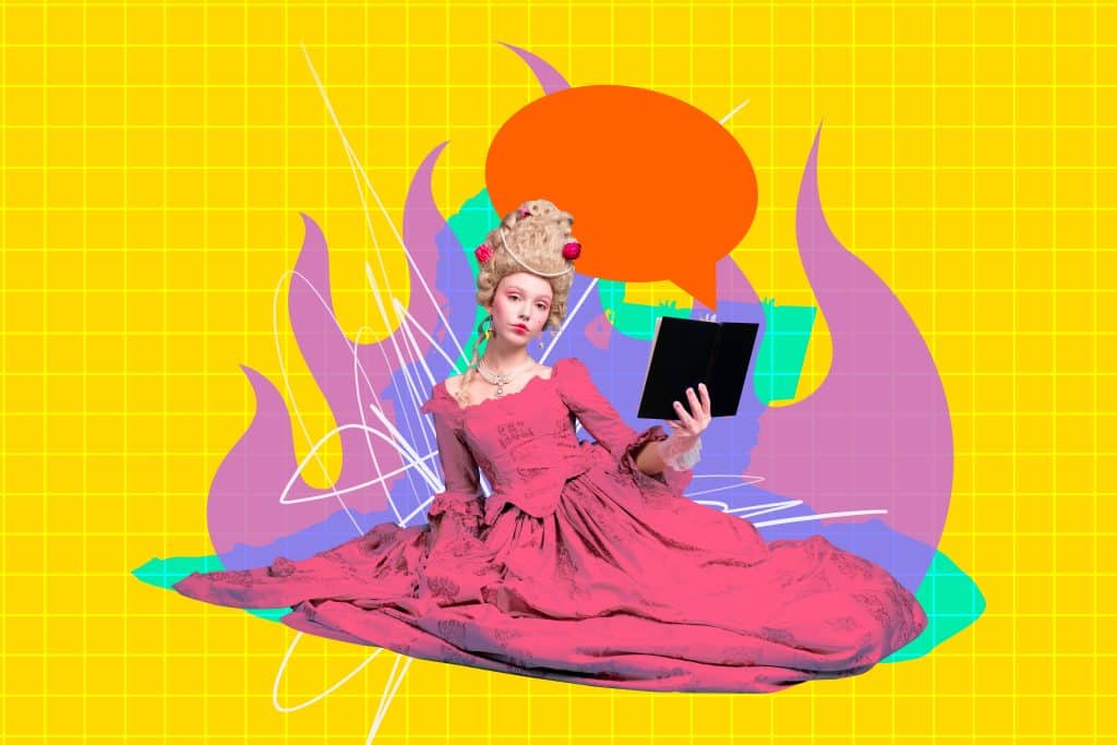 A woman styled with an 18th-century Rococo pouf wig sits in a long pink gown, leaning gently on her left arm while holding an open book in the other hand. (Shutterstock/ Roman Samborskyi)