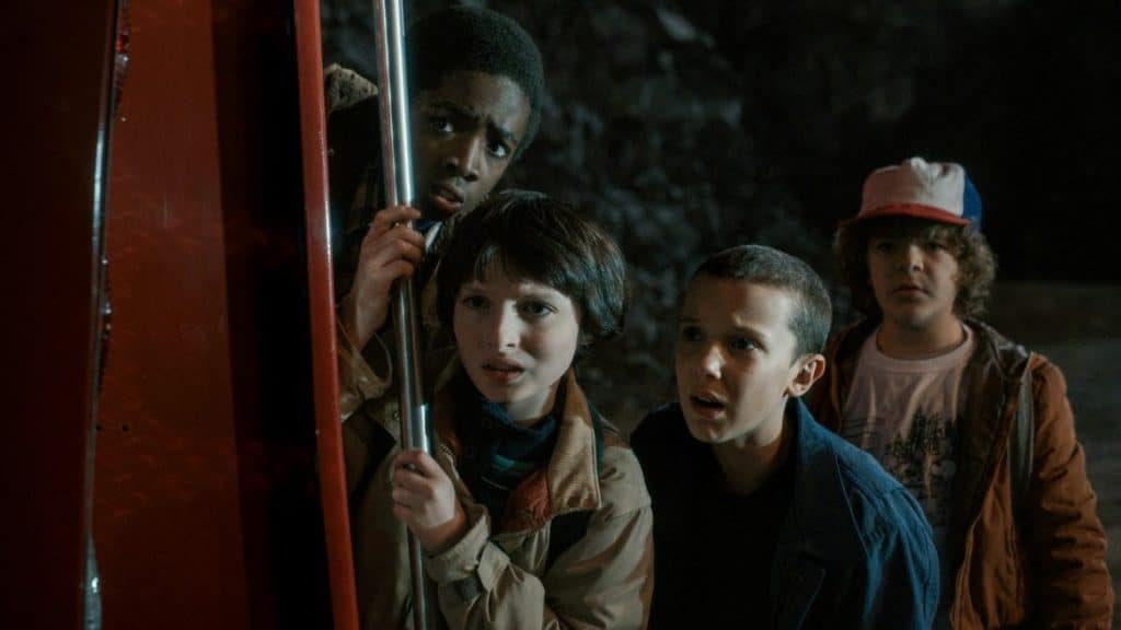 An image of Stranger Things Kids season 1 acting surprised