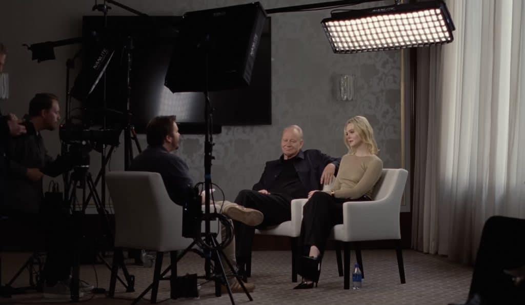 Stellan Skarsgård as Gustav Borg and Elle Fanning as Rachel Kemp in "Sentimental Value." (Credit: Neon)