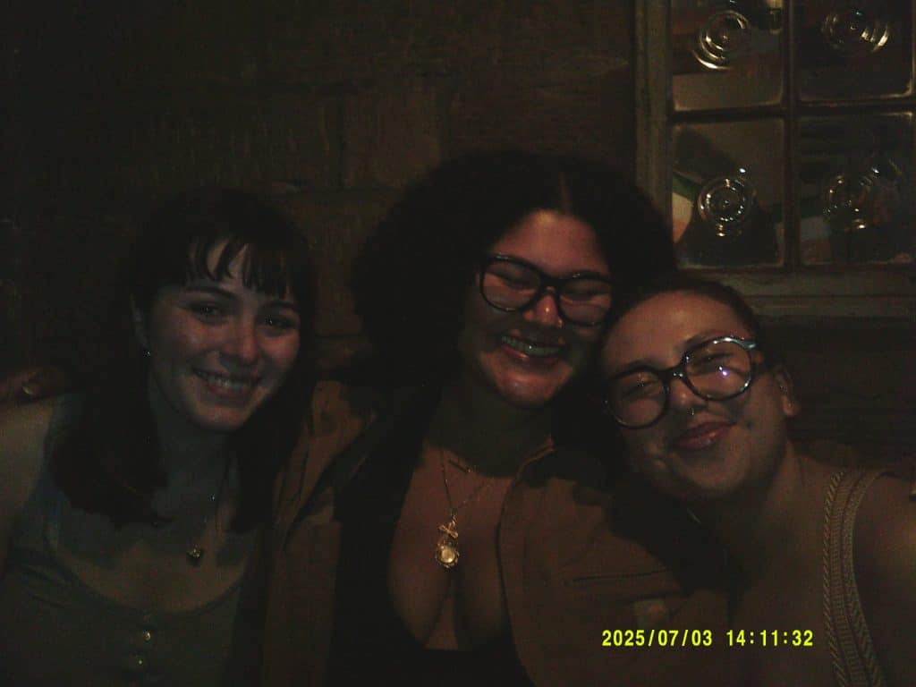 Picture of me and two abroad friends in a pub.
