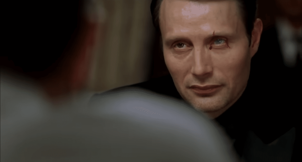 Mads Mikkelsen as Le Chiffre in Casino Royale, with sinister expression.
