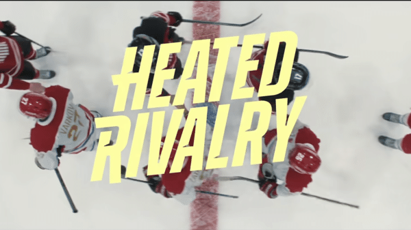 Hockey players on ice for the sportsmanship lineup