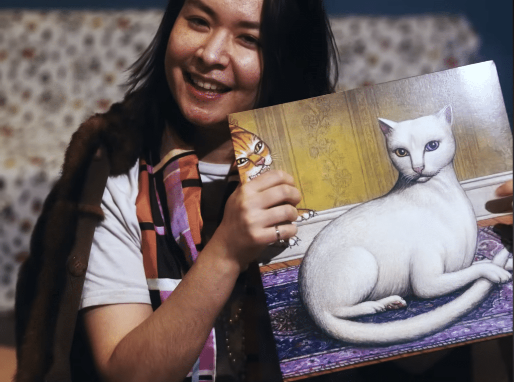 Mitski unboxing her newest album, "Nothing's About to Happen to Me."