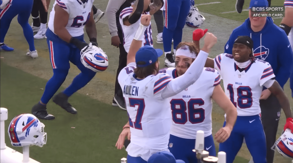 Josh Allen celebrates with teammates after Buffalo’s narrow road win over the Jaguars.