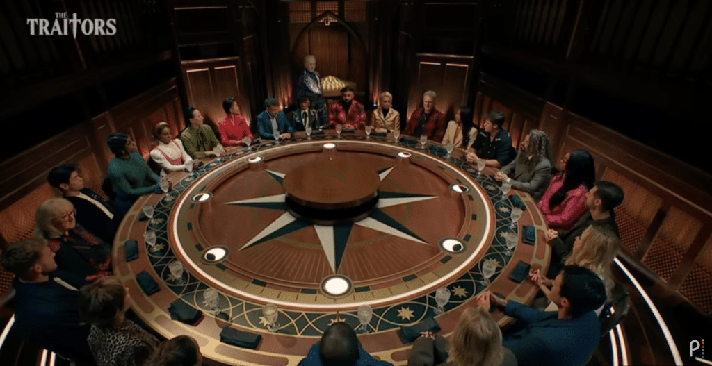 The cast of 'The Traitors' sitting at the roundtable
