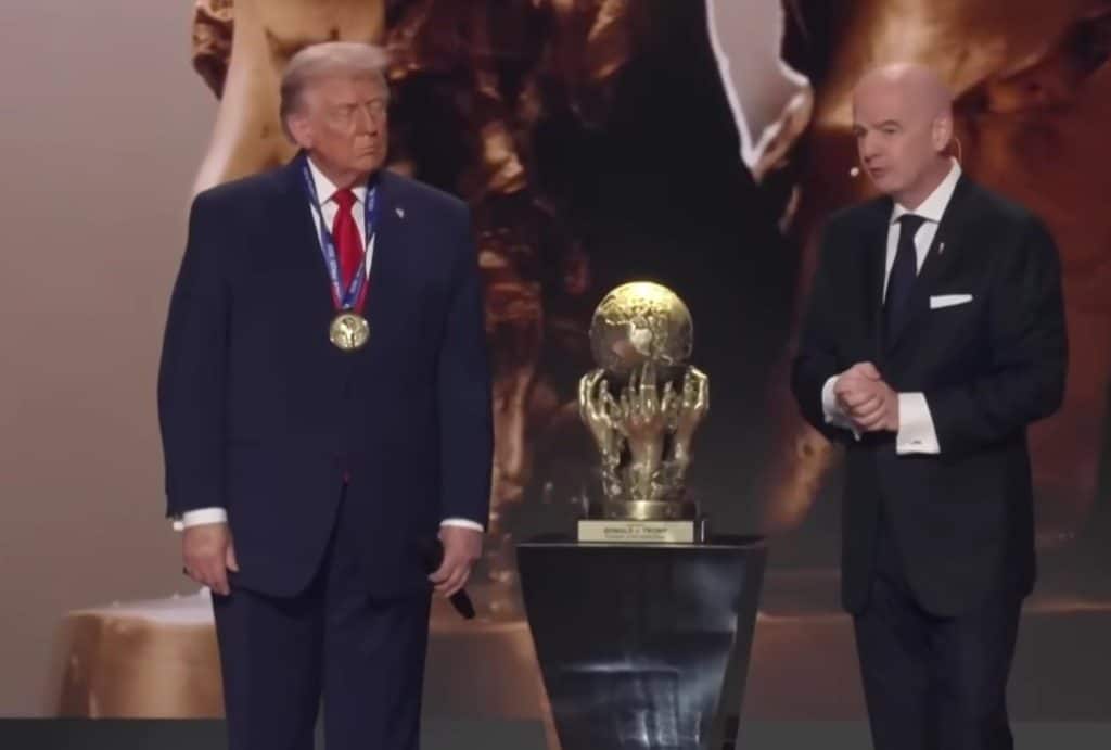 President Trump with Gianni Infantino accepting the UEFA Peace Prize.
