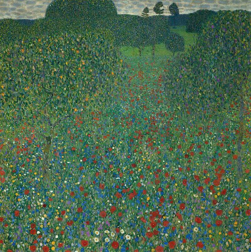 A beautiful field of flowers, trees and fruits lays in front of us. There are bushes of rose, purple flowers, orange fruits and a cloudy sky in the background. The scene seems to represent a summer sunset after a hot day.