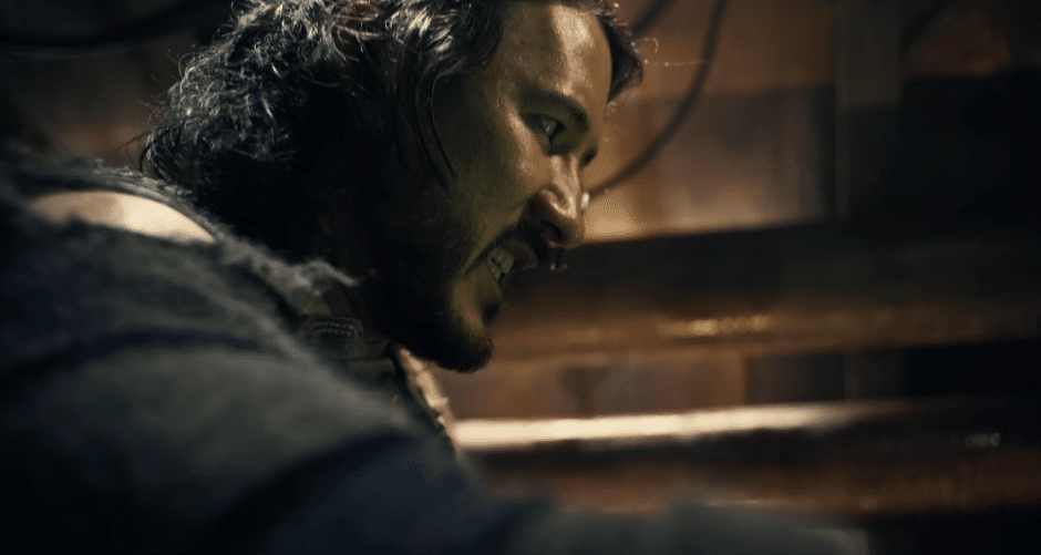 Image of Simon gritting his teeth in intense focus and desperation while driving the submarine.