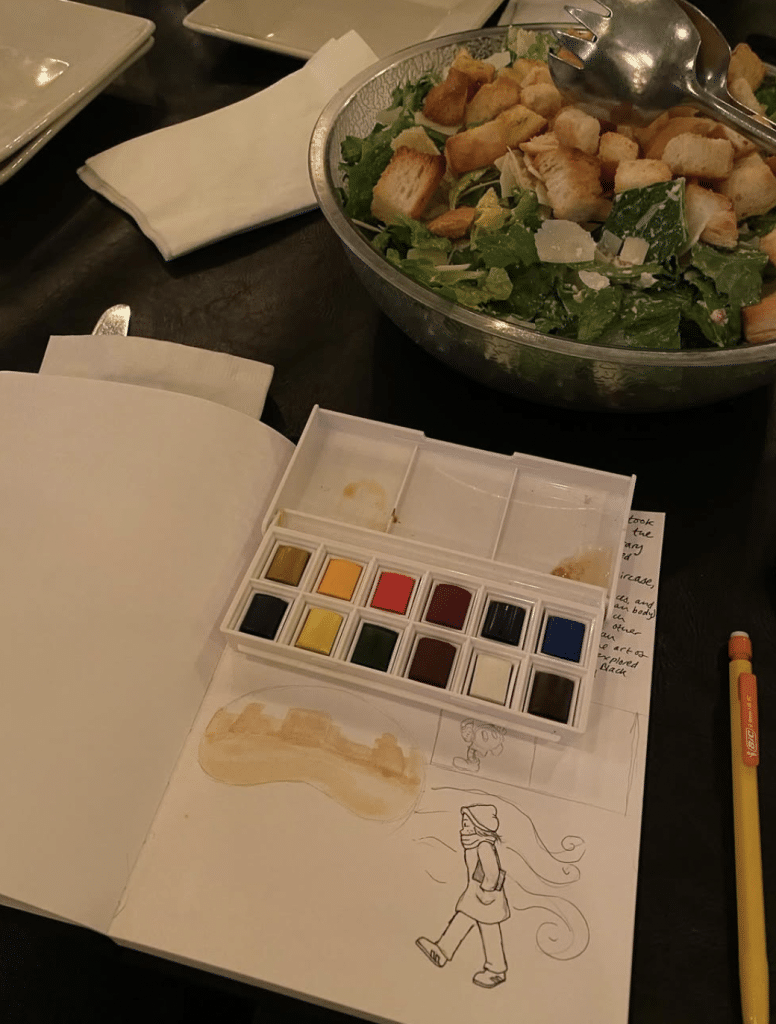 My watercolor setup while journaling at a restaurant. (Maggie Breitenmoser)