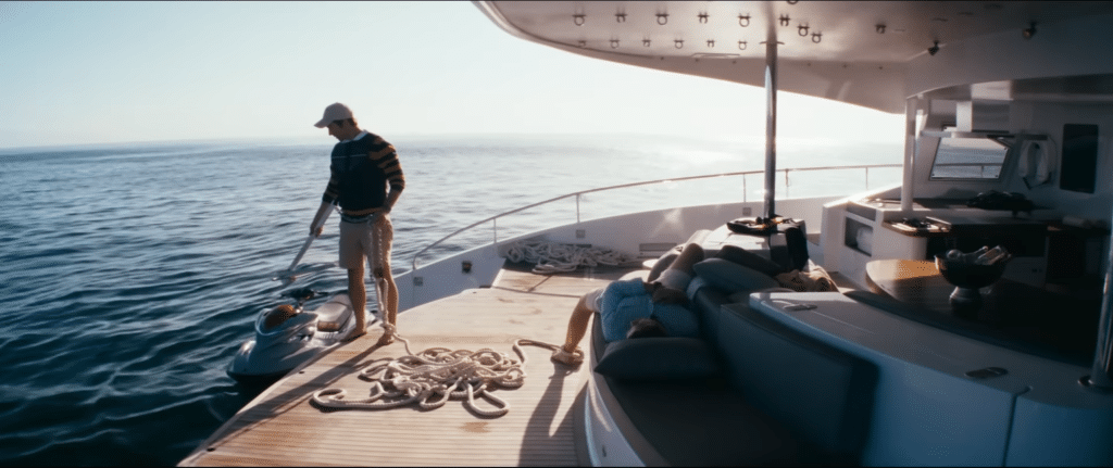 Becket (left) about to sink Taylor (right) in the ocean. (Credit: YouTube/@A24)