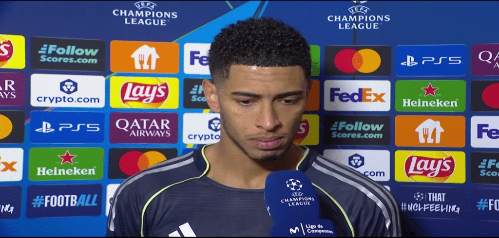 Jude Bellingham reacts after Madrid fall 4-2 to Benfica, narrowly missing direct Round of 16 qualification.