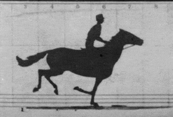 An old black and white film reel of a man riding a horse. The very first thing captured on film.