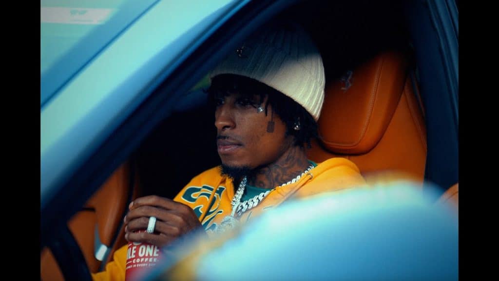YoungBoy in the front seat of his car, thumbnail for "I Want" music video in promotion of Slime Cry album