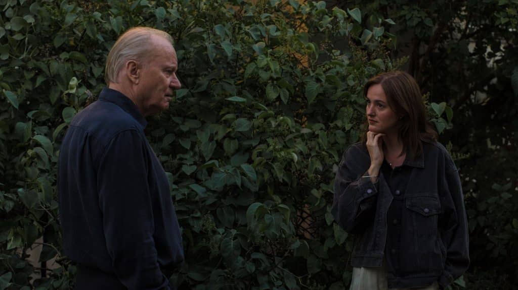 Still of Stellan Skarsgard and Renate Reinsve playing father and daughter in Sentimental Value.