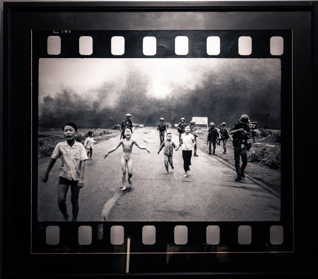 A group of children running down a road during the Vietnam War. The "Napalm Girl" Photo.