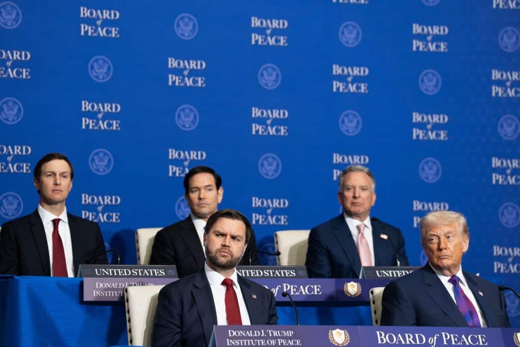 Donald Trump, JD Vance, and other members at the Board of Peace meeting.