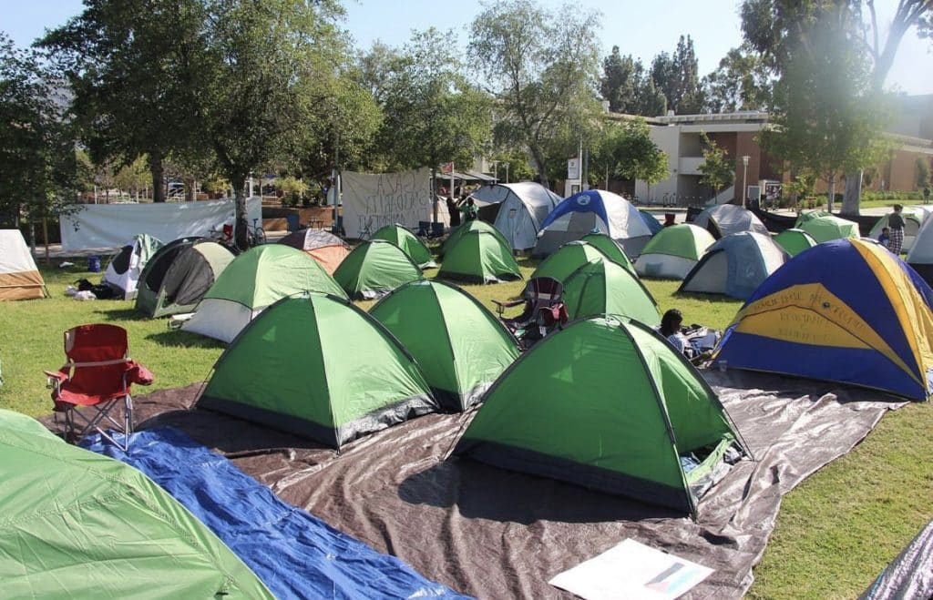 Many tents on the grass at University of Riverside in protest of the Genocide in Palestine.