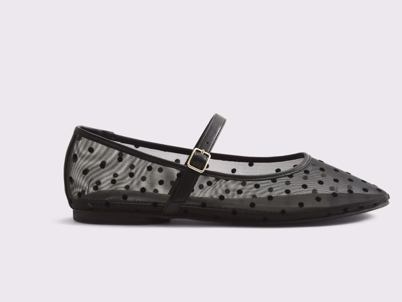 black mesh polka-dotted flats with a strap on top