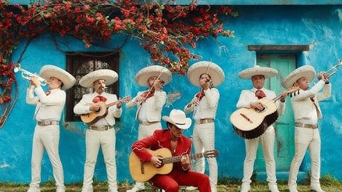 An image from Bruno Mars' music video for "Risk It All" from his new album The Romantic.