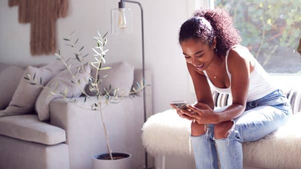 Woman texting on her phone.