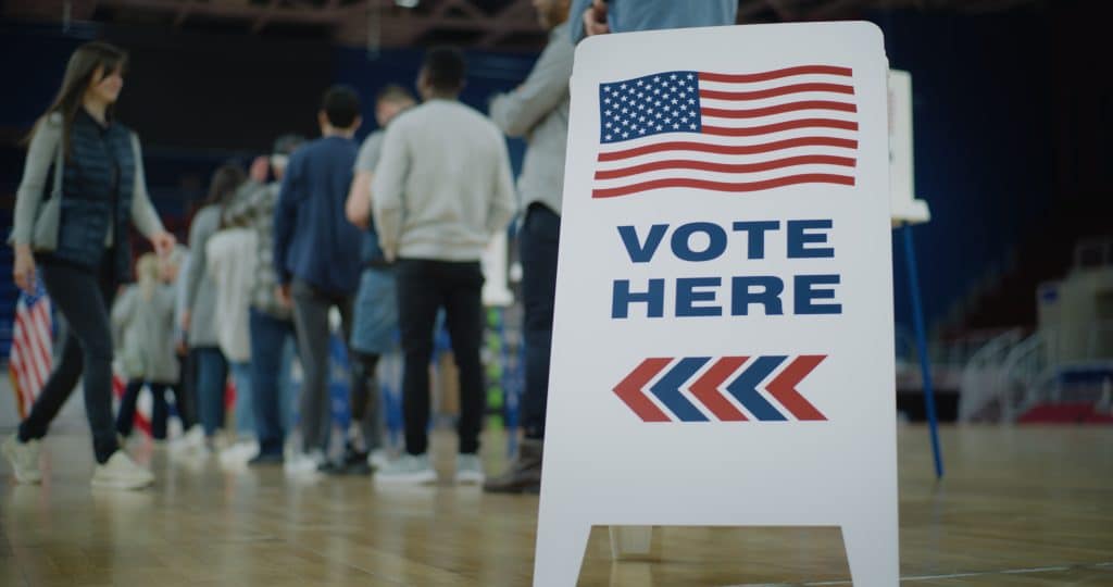 Polling place with a "vote here" sign