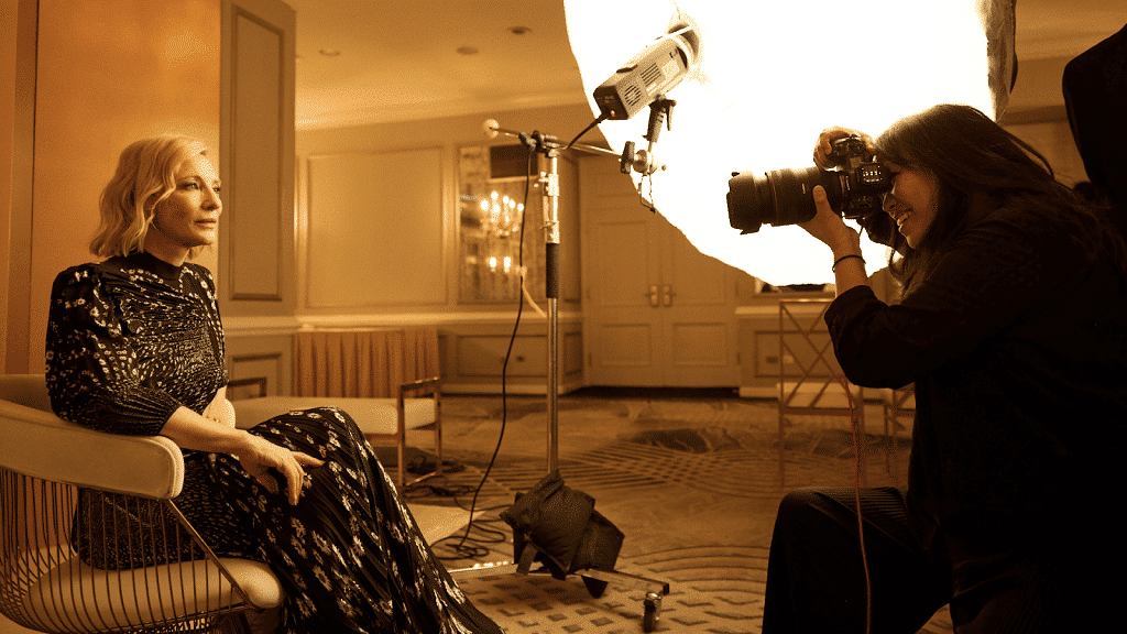 Margaret Lee, Head of Brand & Marketing at the Toronto International Film Festival, photographing Cate Blanchett in the TIFF Tribute Awards portrait studio. Photo Credit: Noel Araquel