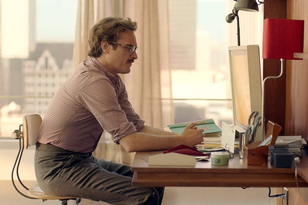 Joaquin Phoenix as Theodore Twombly in "Her." Courtesy of Warner Bros. Pictures.