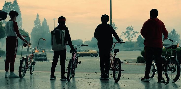 4 Kids with bikes, back to camera, staring off into the horizon in Rim of the World