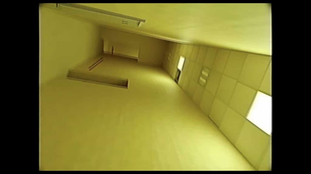 Photo of one of the never-ending hallways in The Backrooms.