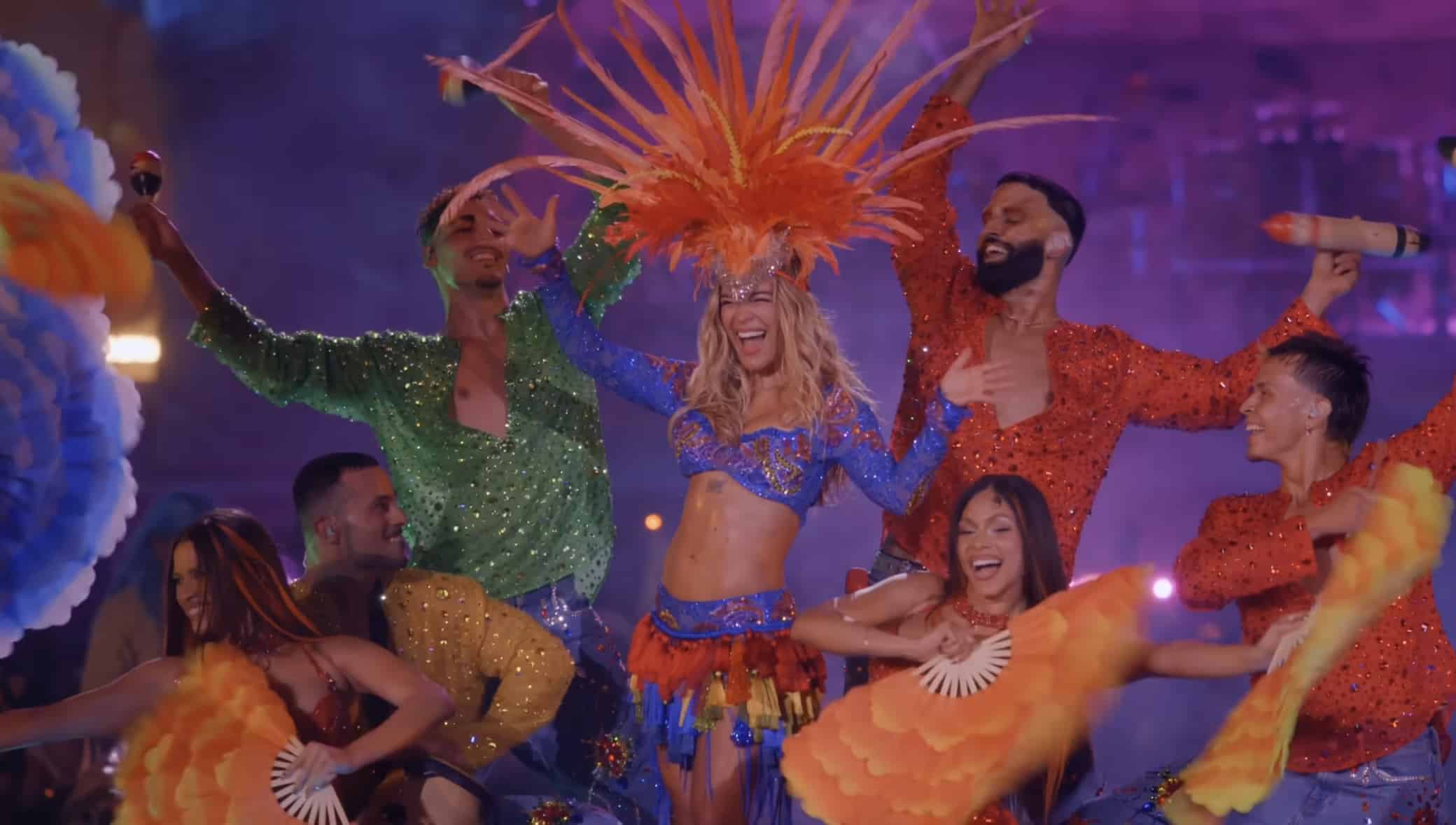 Karol G and her backup dancers pose at Coachella music festival.