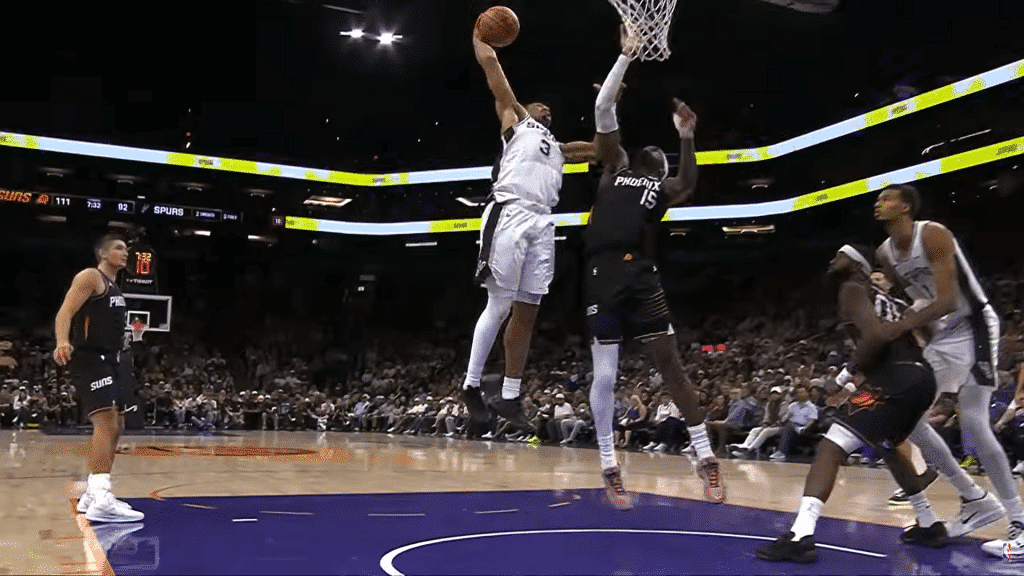 Keldon Johnson finishes strong over Mark Williams in a statement play.
