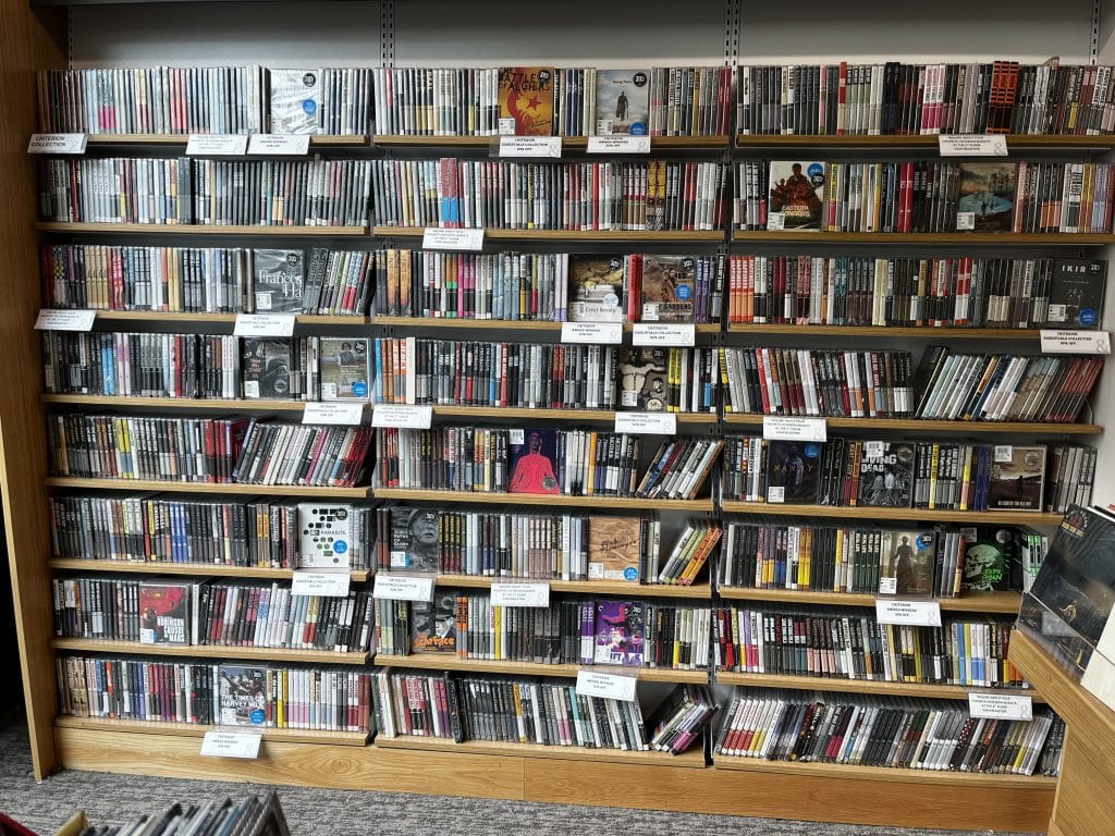 A wall of shelves holds Criterion movies at Barnes & Noble