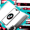 Hands holding an open book with a smartphone placed inside it displaying the TikTok logo, set against a colorful, stylized background of stacked books.