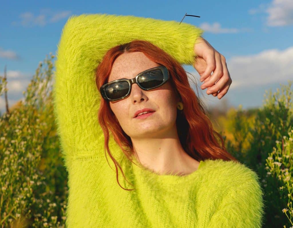 Shows dopamine dressing through bold color choice, highlighting how clothing can influence mood and self-expression.