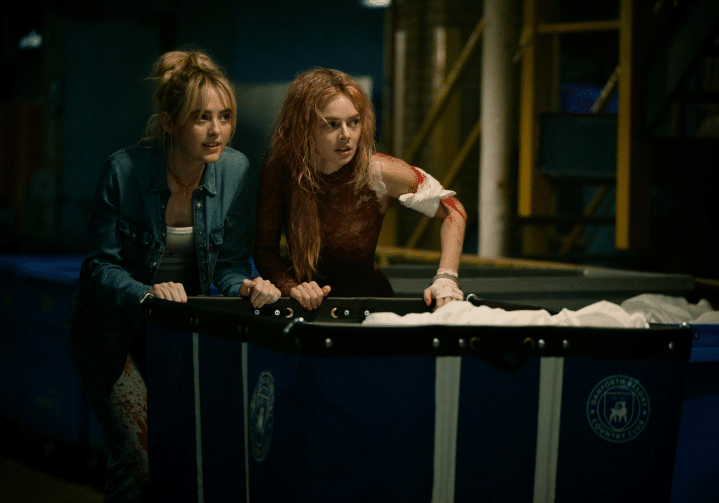 Kathryn Newton (left), Samara Weaving (right) in "Ready or Not 2: Here I Come. (Credit: IMDb)