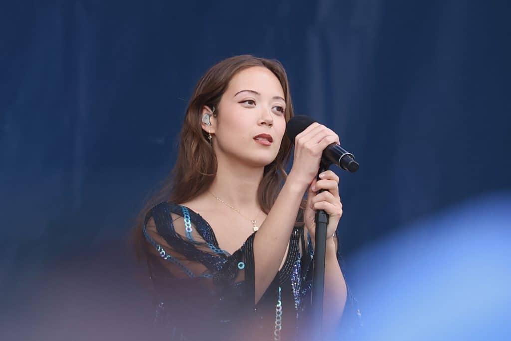 Laufey performing on stage.