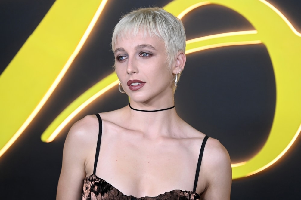 Emma Chamberlain in strapped dress and bleached hair