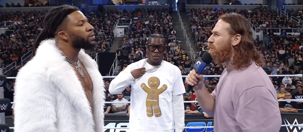 Sami Zayn and Trick Williams cutting a promo on WWE SmackDown
