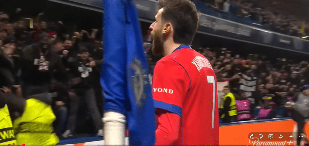 Kvaratskhelia reacts after finding the net vs Chelsea in the Champions League.