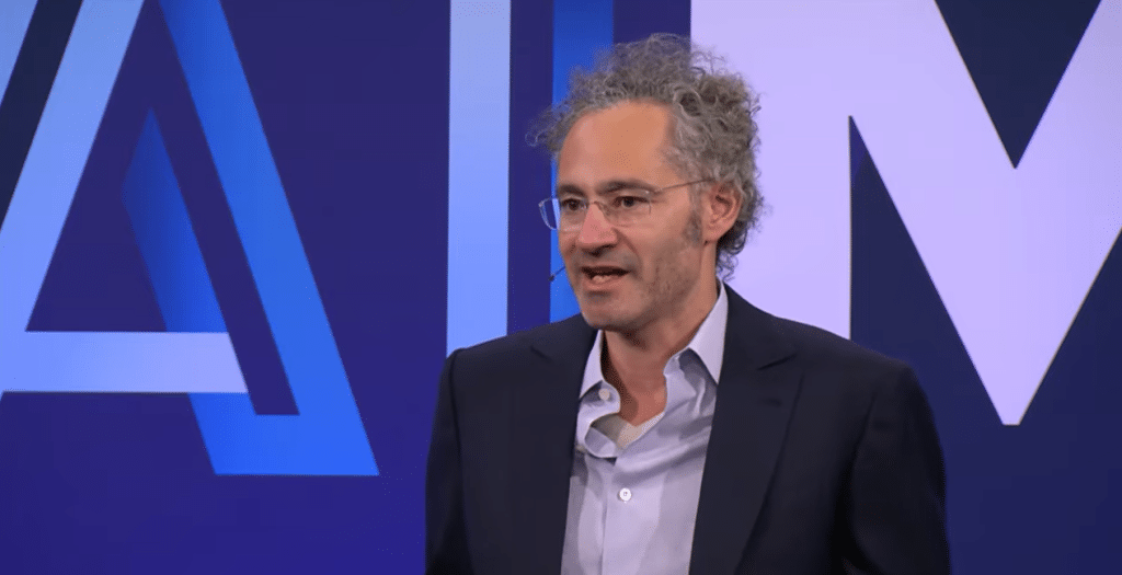 Palantir CEO speaking at a summit.