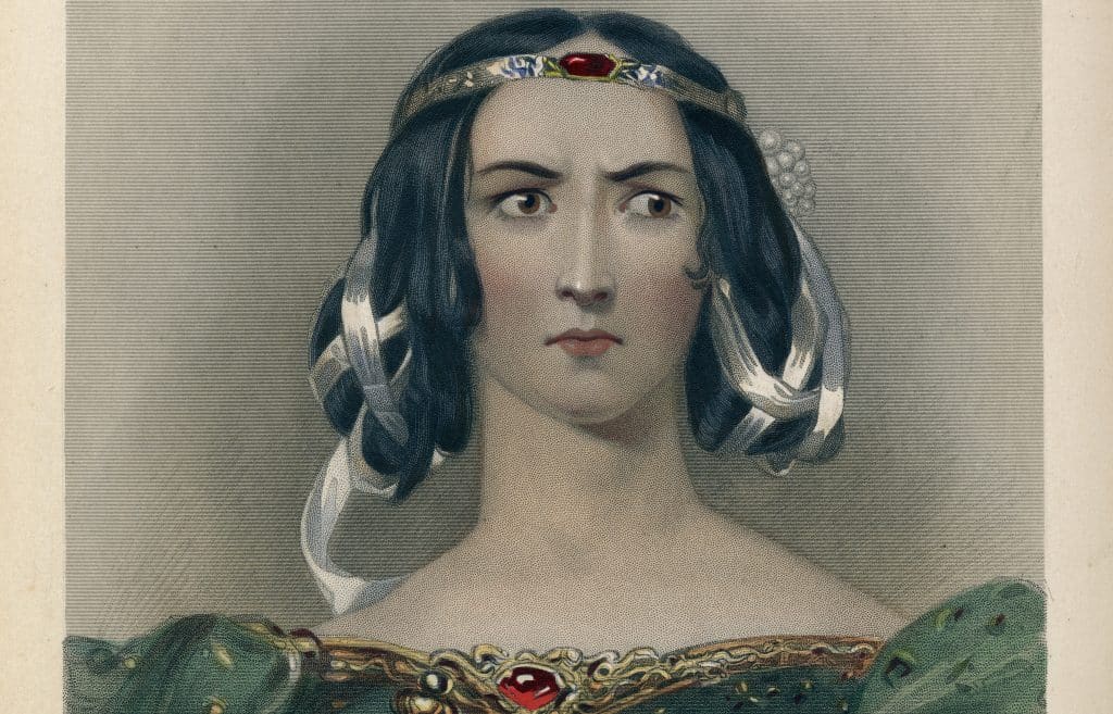 Partial image of a visually rendered figure of Lady Macbeth, showing her head and shoulder's. She has pale skin, dark hair, brown eyes, and a soft brow and jawline. She also wears a headpiece partially entangled with her hair, but also appears to be wearing a green dress. Her browns are furrowed, as she looks off to the side, as though in concern or judgement. The photo is desaturated, and lacks warmer tones.