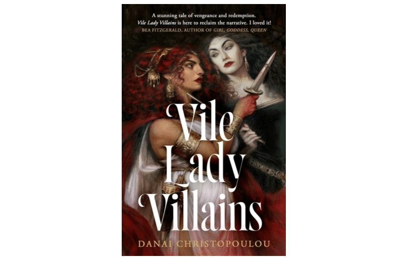 Image of "Vile Lady Villains" UK release cover. Claret and Anassa stand side by side, holding knives to one another's throats.