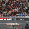 Brock Lesnar delivering an F5 to Oba Femi