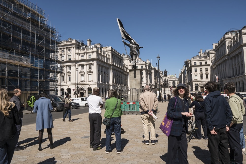 Onlookers gathered around the new Banksy statue