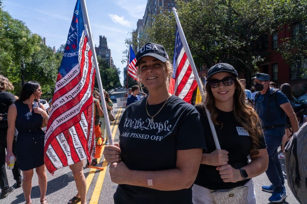 Two young Republican women with flags