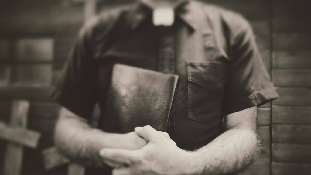 A man holding a bible