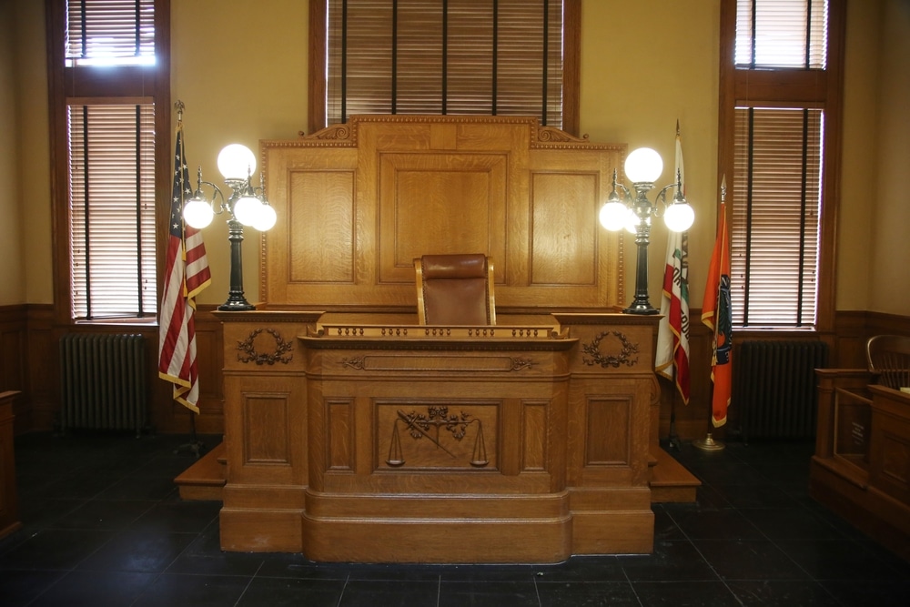 Inside a courthouse with a focus on the Judges bench