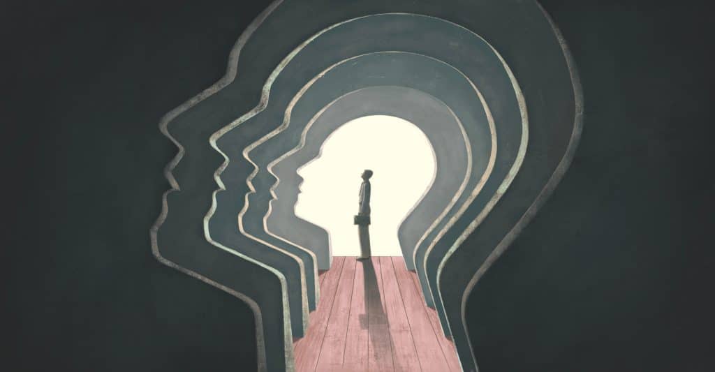 Illustration of a man standing inside a corridor of upturned faces